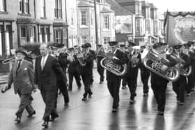 The Mayor of South Shields, Ald R Dodds and Ald Jones, both miners at Harton Colliery, march in front of Harton Colliery band on the way to Tyne Dock railway station to go to Durham miners' gala.