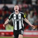 Sean Longstaff of Newcastle United celebrates after scoring the fifth and winning penalty in the penalty shootout during the Carabao Cup Second Round match between Nottingham Forest and Newcastle United at City Ground on August 28, 2024 in Nottingham, England. (Photo by Michael Regan/Getty Images)