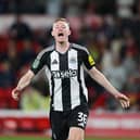 Sean Longstaff of Newcastle United celebrates after scoring the fifth and winning penalty in the penalty shootout during the Carabao Cup Second Round match between Nottingham Forest and Newcastle United at City Ground on August 28, 2024 in Nottingham, England. (Photo by Michael Regan/Getty Images)