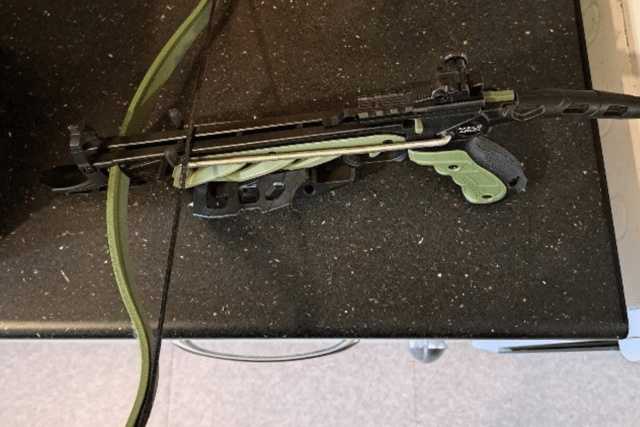 A loaded crossbow was also seized.