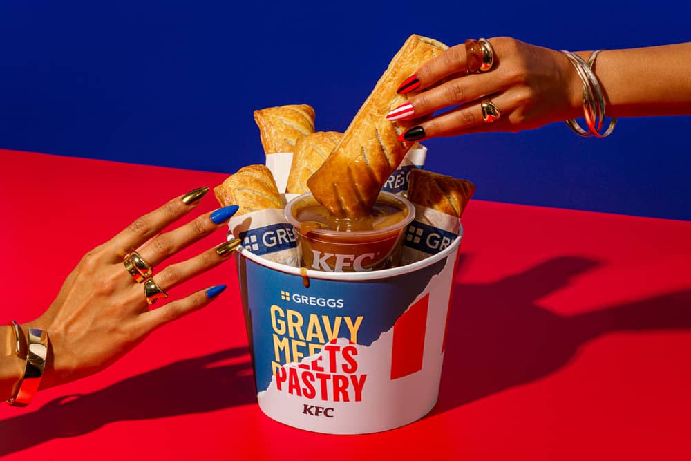Greggs and KFC have teamed up to create the "culinary crossover of the century" in the form of a sausage roll drenched in gravy.