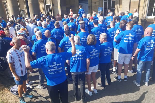An important message on the backs of the walkers' t-shirts.