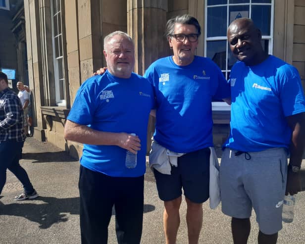 Former SAFC players Gary Bennett and Mick Harford alongside Fans Museum founder Michael Ganley.