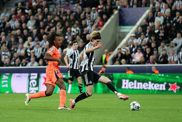 Anthony Gordon of Newcastle United scores his team's first goal during the UEFA Champions League 2025/26 League Phase MD1 match between Newcastle United FC and FC Barcelona at St James' Park on September 18, 2025 in Newcastle upon Tyne, England. (Photo by Stu Forster/Getty Images)