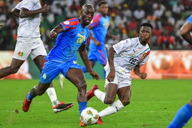 Newcastle United forward #20 Yoane Wissa (L) fights for the ball with Guinea's midfielder #18 Aguibou Camara during the Africa Cup of Nations (CAN) 2024 quarter-final football match between DR Congo and Guinea at the Alassane Ouattara Stadium in Ebimpe, Abidjan on February 2, 2024. (Photo by SIA KAMBOU / AFP) (Photo by SIA KAMBOU/AFP via Getty Images)