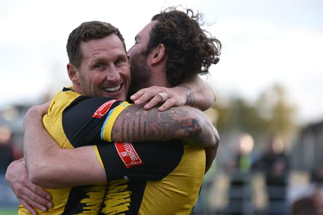 Gary Martin and Matty Elsdon celebrate after Hebburn Town score in their 8-0 win against Northern Premier League Premier Division rivals Warrington Town (photo Tyler Lopes)