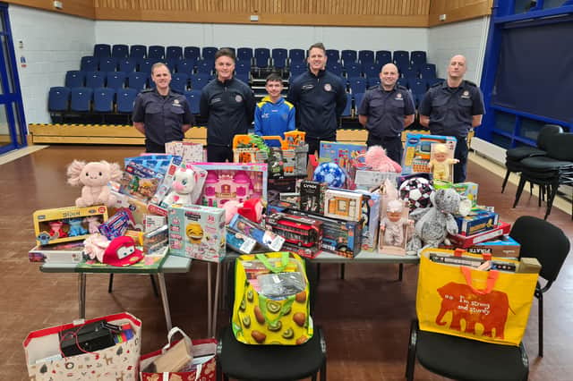 Luke Hedley BCyA with firefighters at South Shields Fire Station.