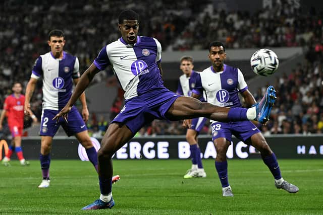 Toulouse's French defender #24 Dayann Methalie controls the ball Toulouse's French defender #24 Dayann Methalie during the French L1 football match between Toulouse FC and Paris Saint-Germain at The TFC Stadium in Toulouse, southwestern France on August 30, 2025. (Photo by Lionel BONAVENTURE / AFP)