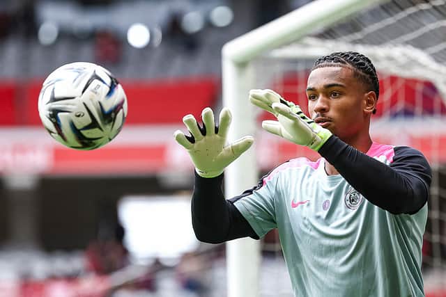 Toulouse's French goalkeeper Guillaume Restes warms up ahead of the French L1 football match between LOSC Lille and Toulouse FC at the stade Pierre-Mauroy in Villeneuve-d'Ascq, northern France, on September 14, 2025.