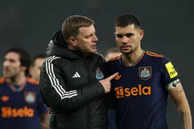 Eddie Howe, Manager of Newcastle United, talks with Bruno Guimaraes following the team's victory in the Premier League match between Tottenham Hotspur and Newcastle United at Tottenham Hotspur Stadium on February 10, 2026 in London, England. (Photo by Richard Pelham/Getty Images)