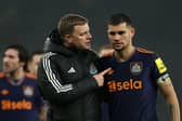 Eddie Howe, Manager of Newcastle United, talks with Bruno Guimaraes following the team's victory in the Premier League match between Tottenham Hotspur and Newcastle United at Tottenham Hotspur Stadium on February 10, 2026 in London, England. (Photo by Richard Pelham/Getty Images)