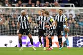 Joelinton and Anthony Gordon of Newcastle United react after Lamine Yamal of FC Barcelona (not pictured) scores his team's first goal during the UEFA Champions League 2025/26 Round of 16 First Leg match between Newcastle United FC and FC Barcelona at St James' Park on March 10, 2026 in Newcastle upon Tyne, England. (Photo by Stu Forster/Getty Images)