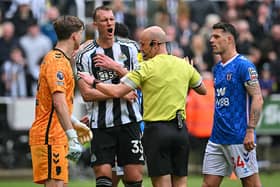 Newcastle United's English defender #33 Dan Burn (2nd L) reacts after the team's second goal was disallowed during the English Premier League football match between Newcastle United and Sunderland at St James' Park in Newcastle-upon-Tyne, north east England on March 22, 2026. (Photo by ANDY BUCHANAN / AFP via Getty Images) 
