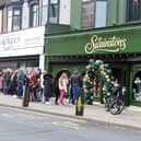 Crowds queuing outside of the Mr Swainstons shop, on Fowler Street, in South Shields.