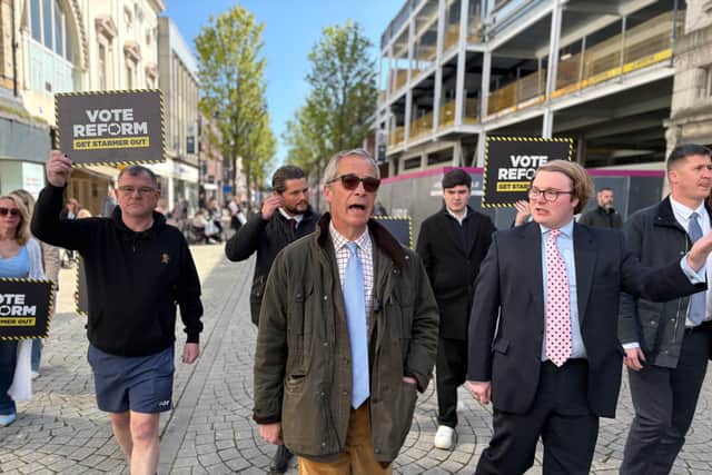 Reform UK leader Nigel Farage walks down King Street, South Shields. He vows to save the high street if his party get representatives at the upcoming local elections.