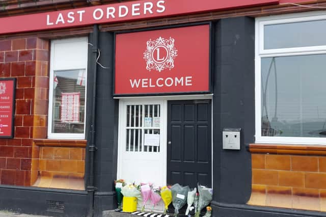 Floral tributes to Robbie were left at The Last Orders, on Stanley Street, in South Shields.