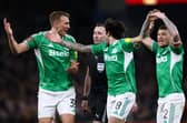Kieran Trippier, Dan Burn and Sandro Tonali of Newcastle United react after referee Chris Kavanagh and assistant referee Nick Greenhalgh failed to award a penalty during the Emirates FA Cup Fourth Round match between Aston Villa and Newcastle United  on February 14, 2026 in Birmingham, England. (Photo by Dan Istitene/Getty Images)