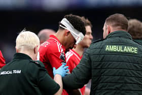 Morgan Gibbs-White of Nottingham Forest receives medical treatment following a clash with Robert Sanchez of Chelsea (not pictured) during the Premier League match between Chelsea and Nottingham Forest at Stamford Bridge on May 04, 2026 in London, England. (Photo by Justin Setterfield/Getty Images)