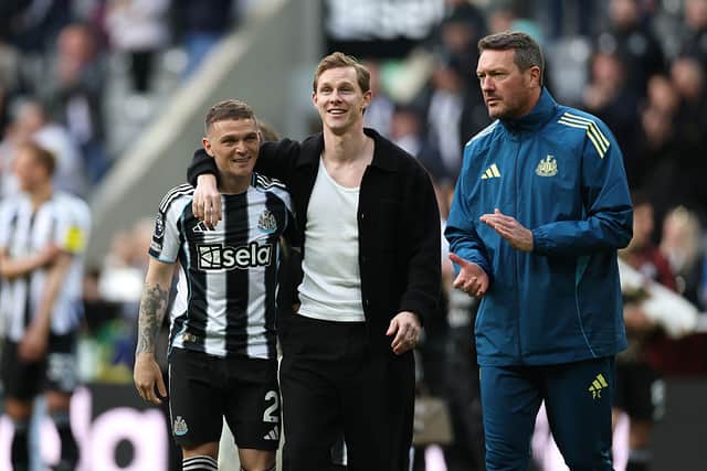 Kieran Trippier (L) and Emil Krafth of Newcastle United embrace after the Premier League match between Newcastle United and West Ham United at St James' Park on May 17, 2026 in Newcastle upon Tyne, England. (Photo by Stu Forster/Getty Images)