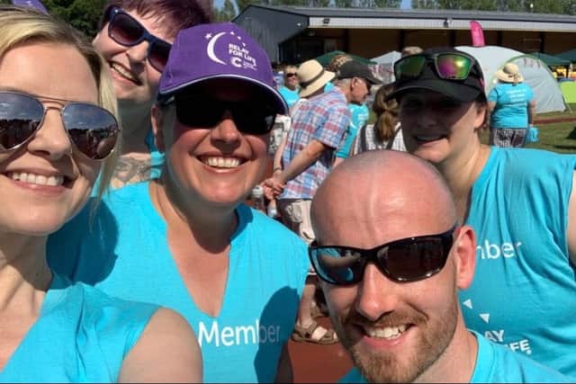 Team Combat members, l-r, Catherine Coutts, Michelle Quinn, Beth Thompson, Chris Cozier and Lisa Paulson at a Relay for Life.