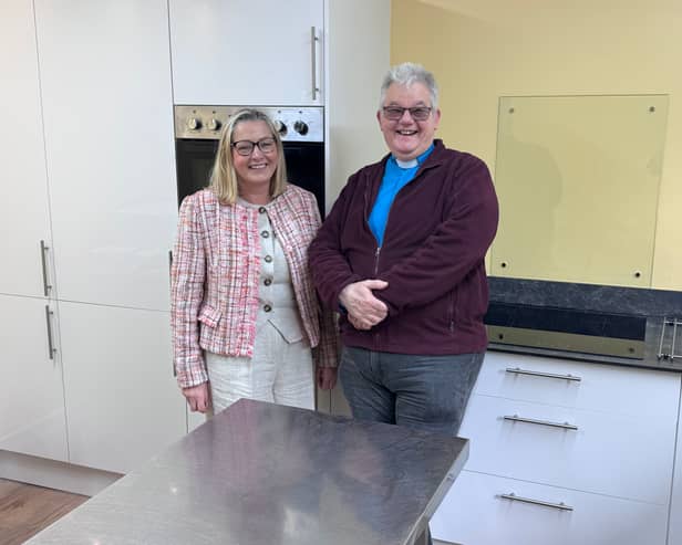 The Rev Vernon Cuthbert with churchwarden Beverley George in the new kitchen.