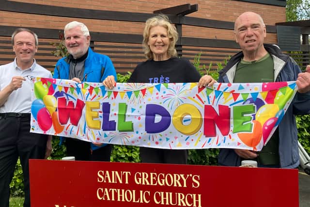 Father Keith of St Gregory’s Church, South Shields, with Jim and Maria Frazer, and Marton Kinlen at the end of their ride.