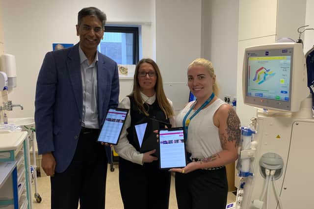 Dr Sid Ahmed with Rachael Barham, of HI NENC, and Hayley Dixon, Renal Administrator, with the tablets handed out to patients.