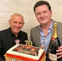 Peter Reid being presented with an SAFC themed birthday cake for his 70th birthday by Paul Goffy Gough at the Roker Hotel.