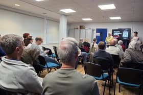 Members of the public have gathered at the Ocean Road Community Centre for a screening of The People's Emergency Briefing.