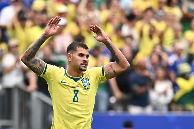 Brazil's midfielder #08 Bruno Guimaraes reacts after missing a goal opportunity during the 2026 World Cup round of 32 football match between Brazil and Japan at the Houston Stadium in Houston on June 29, 2026.  (Photo by Paul ELLIS / AFP via Getty Images)