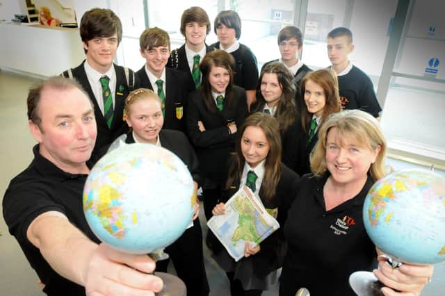 St Wilfrid's students pictured in 2011 as they prepared to visit India to help build a school. Leaders Lynn Watson and Tony Stout are pictured with them.