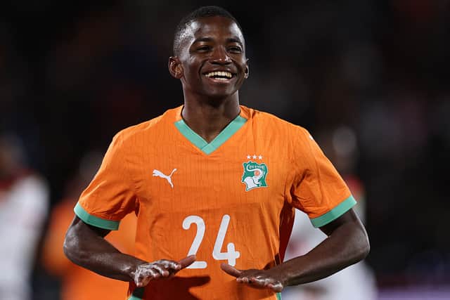 Ivory Coast's forward #24 Bazoumana Toure celebrates scoring the team's third goal during the Africa Cup of Nations (CAN) round of 16 football match between Ivory Coast and Burkina Faso at the Grand Stadium in Marrakesh on January 6, 2026. (Photo by FRANCK FIFE / AFP via Getty Images)