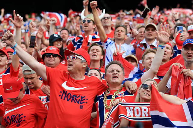 Norway fans celebrate after the 2-1 victory against Brazil. (Photo by Elsa/Getty Images)