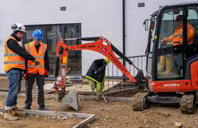 Kieran Pemberton, Robertson site manager (left), with Damien Lee, of Hewitson Limited (right), and Jack Grainger, a Sunderland College student who completed a work placement at the Griffin Court development.