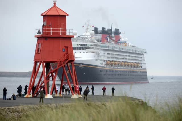 Crowds watch as the giant cruise liner arrives in the North East nine years ago.