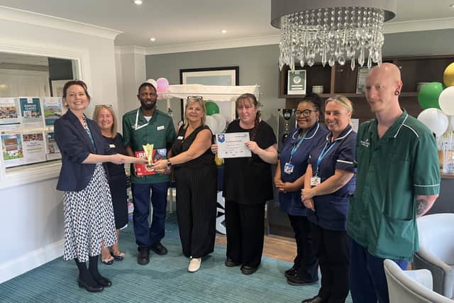 Bedewell Grange staff accepting their IPC Excellence Award from the South Tyneside and Sunderland NHS Foundation Trust.