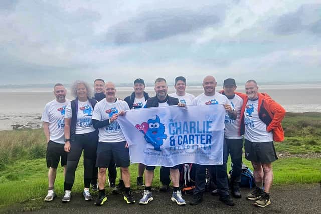 A team from the Charlie and Carter Foundation taking part in a walk of Hadrian's Wall during another fundraiser event.