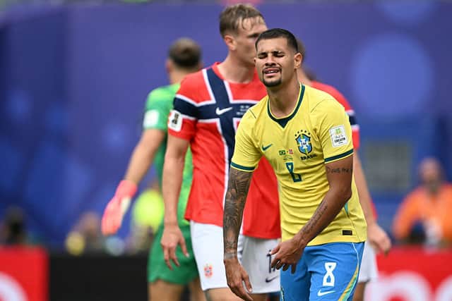 Brazil's midfielder #08 Bruno Guimaraes reacts after missing a penalty during the 2026 World Cup round of 16 football match between Brazil and Norway at the New York/New Jersey Stadium in East Rutherford on July 5, 2026. (Photo by MAURO PIMENTEL / AFP via Getty Images)