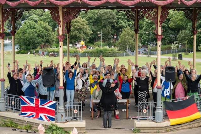 The Women of Wuppertal Choir in the bandstand in the South Marine Park.