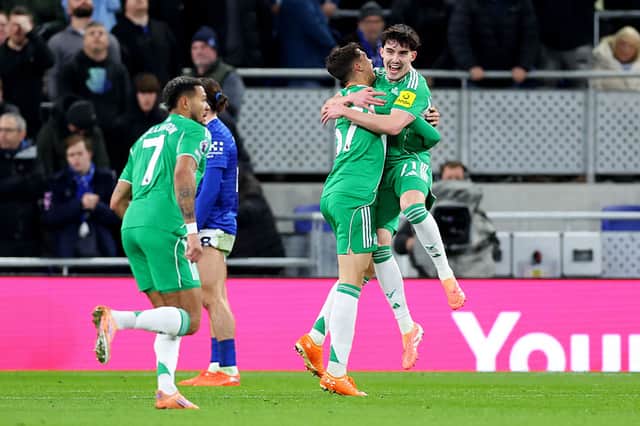 Lewis Miley of Newcastle United celebrates scoring his team's second goal with teammate Tino Livramento during the Premier League match between Everton and Newcastle United at Hill Dickinson Stadium on November 29, 2025 in Liverpool, England. (Photo by Molly Darlington/Getty Images)