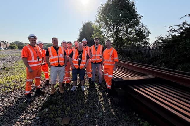 The Nexus team with the section of rail which is being donated to the Len Gibson memorial, in South Shields.