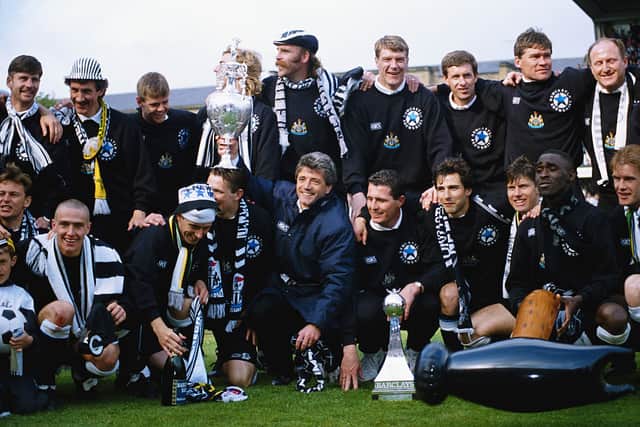 Newcastle United manager Kevin Keegan holds the League Division One trophy after the League Division One match against Leicester City at St James' Park on May 9, 1993 in Newcastle, England,( Back row left to right) Paul Bracewell, Terry McDermott (Assistant manager) Mark Robinson, Barry Venison (obscured) Brian Kilcline, Tommy Wright, Kevin Sheedy, Derek Fazackerley (coach) Derek Wright (physio) and Scott Sellars, (front row left to right) John Beresford, Lee Clark, David Kelly, Steve Howey (partially obscured) KK, Liam O' Brien, Gavin Peacock, Robert Lee, Andy Cole and Kevin Scott. (Photo by Stevie Morton/Allsport/Getty Images)