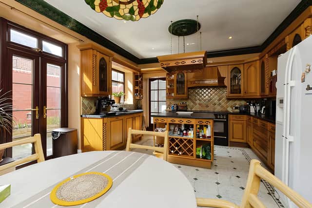 The kitchen forms part of a spacious layout designed to support everyday family life in a home of impressive proportions.