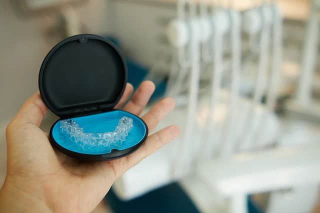 The aligners can be stored easily in a case.