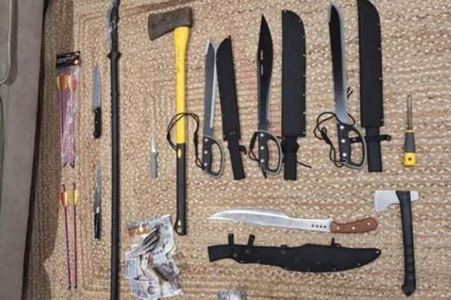 Officers made four arrests, as well as seizing weapons and money following the alleged incident.