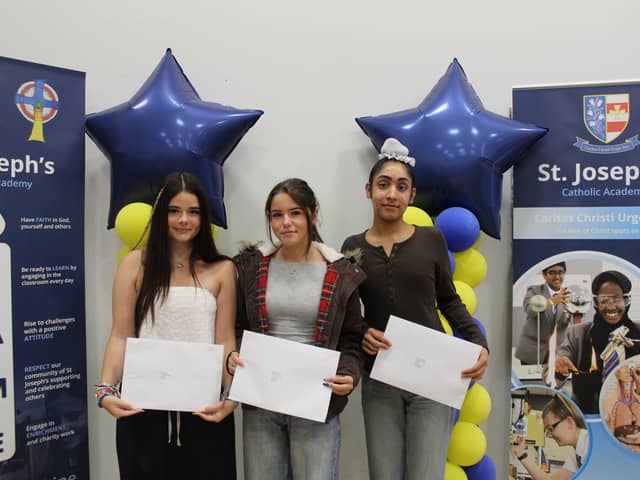 St Joseph's Catholic Academy pupils Hartegh, Katie and Emily with their GCSE results.