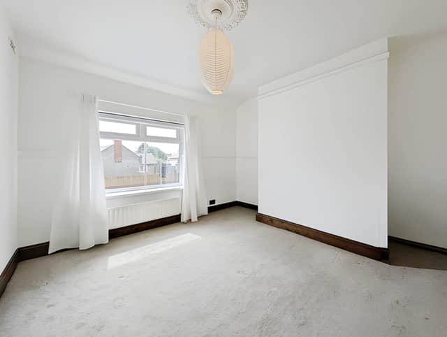 Two reception rooms provide flexible spaces for relaxing at home or spending time with family and friends