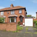 The semi-detached Marsden Road home combines traditional residential appeal with useful off-street parking and a garage