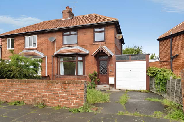 The semi-detached Marsden Road home combines traditional residential appeal with useful off-street parking and a garage