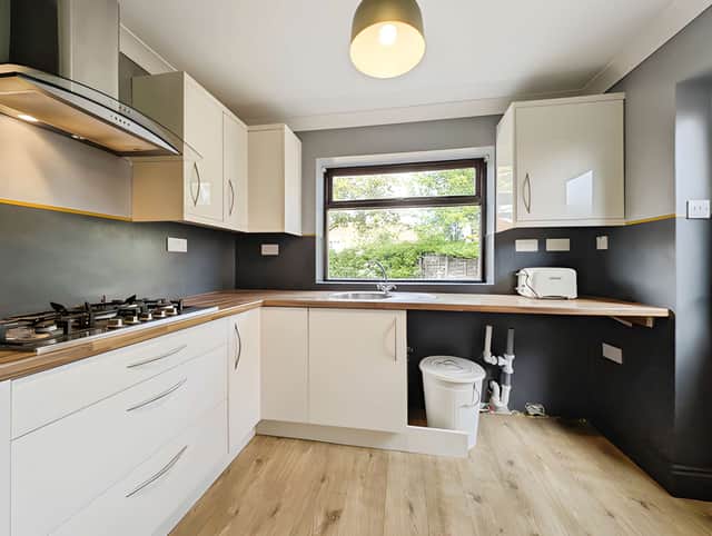 Natural light helps give the bright and airy kitchen a welcoming feel for everyday cooking and family routines